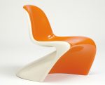 Rotomoulded orange and white coloured S-shape chair