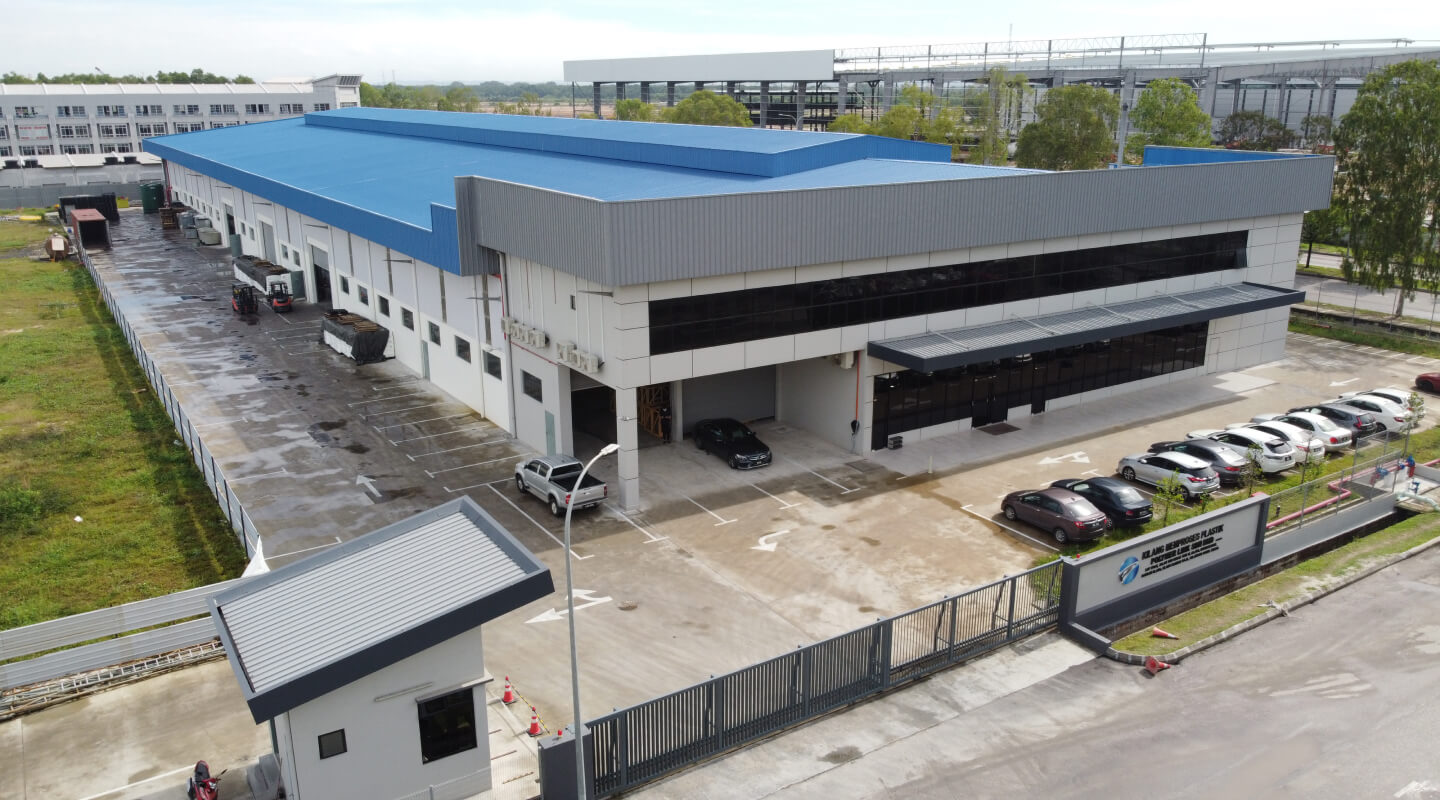 The white coloured building with a blue coloured roof is the corporate headquarters of Polymer Link Holdings Berhad in Malaysia