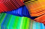 Fluorescent plastic plates arranged in a domino way are manufactured using Polymer Link's Fluorescent Effect Masterbatch, which can emit luminescence under various lighting conditions