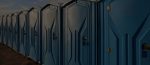 Blue portable toilets made from rotational moulding materials by Polymer Link