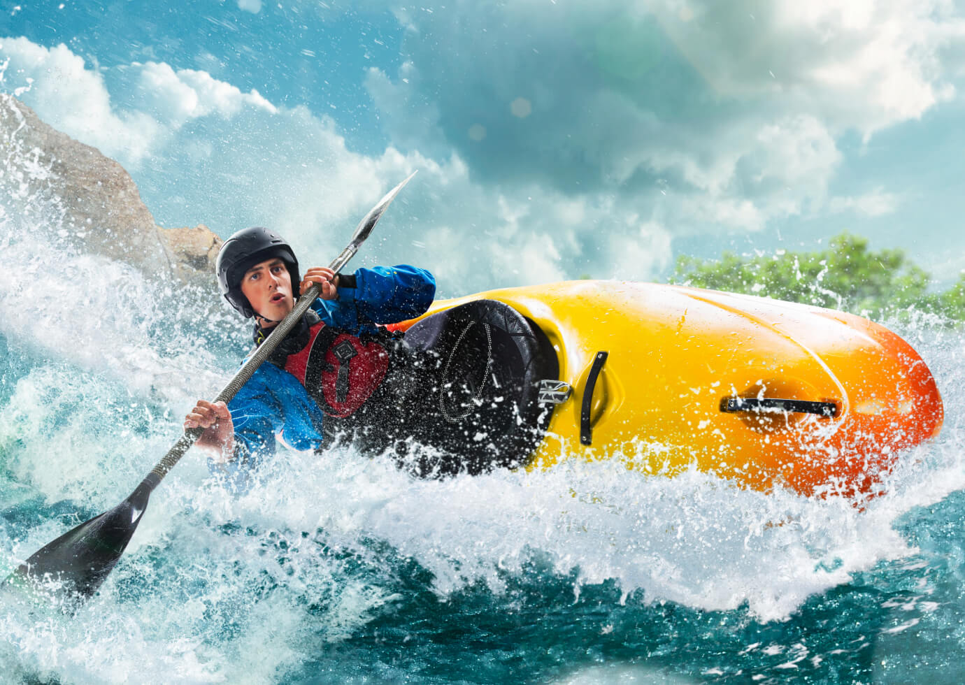 A man kayaking using kayak and double-blade paddle manufactured from Polymer Link's Hyperene Series