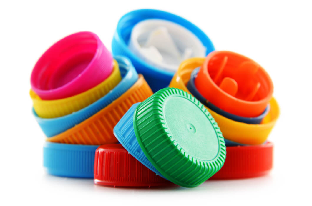 Different colours of bottle caps are made using an anti-slip additive masterbatch produced by Polymer Link
